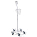 A white, wheeled medical stand supports a pole with a small tray and possibly a light, situated in a simple, clean environment.