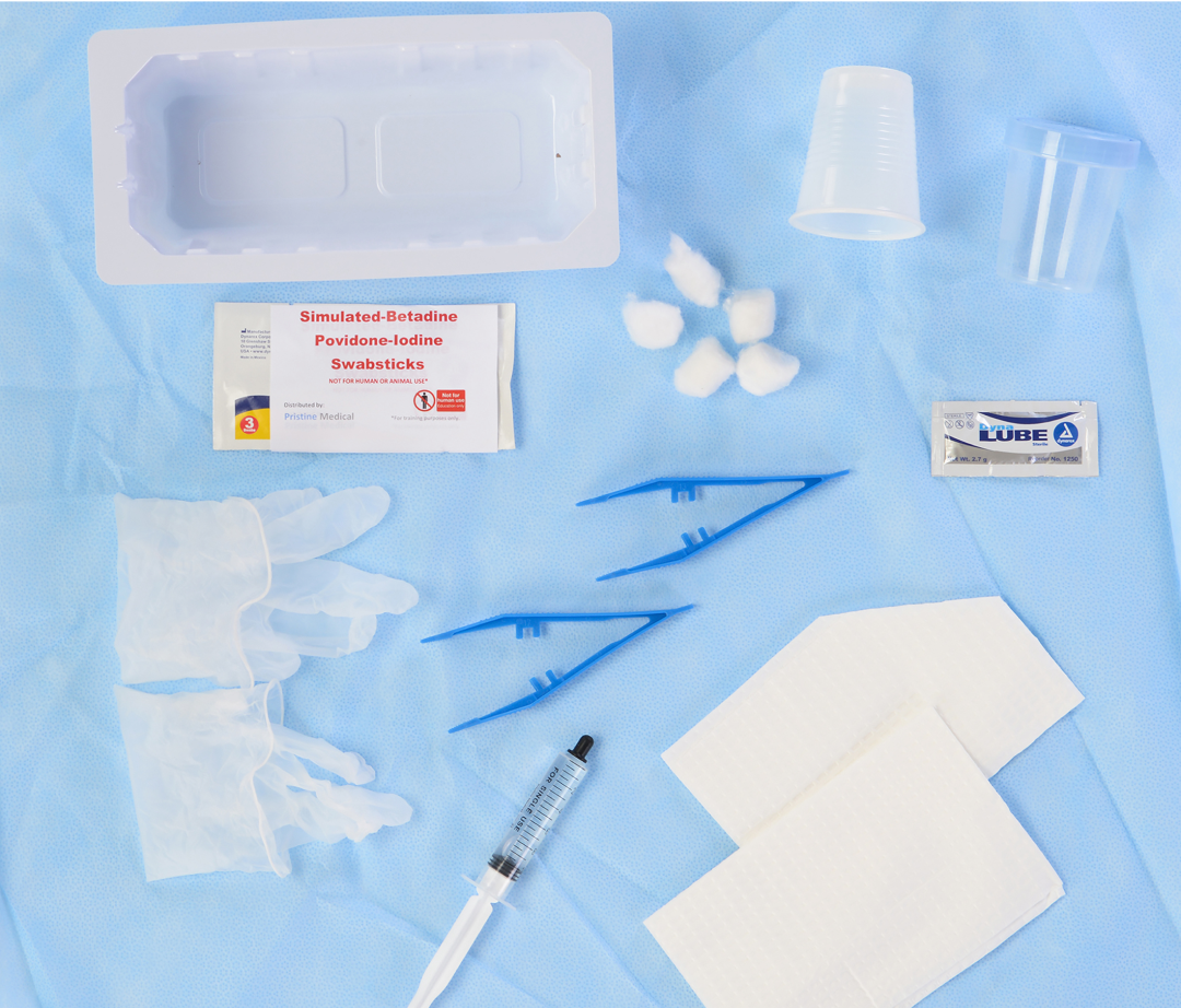A medical kit lies on a blue surface. It includes gloves, swabs, tweezers, a syringe, cotton balls, cups, and simulated-betadine povidone-iodine swabsticks. The kit is for medical use.