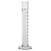 A graduated cylinder stands upright, displaying volume markings, on a plain white background.