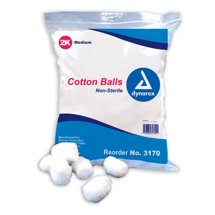A bag of non-sterile cotton balls sits on a white background; some balls spill out. The bag is labeled "Cotton Balls Non-Sterile," "2K Medium," "Reorder No. 3170," and "dynarex."