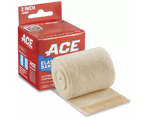 A beige elastic bandage, rolled out, with a hook-and-loop closure, rests beside its ACE brand packaging.