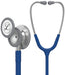 A Littmann Classic III stethoscope, with a blue tubing and grey chest piece, is shown in a display against a white background. The chest piece is labeled "Littmann Classic III Made in U.S.A."