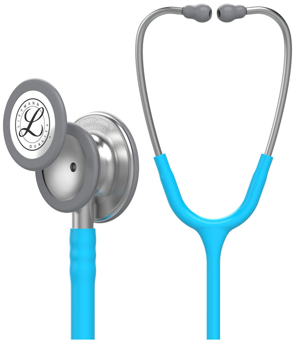 A Littmann Classic III stethoscope, with a light-blue tubing and grey chestpiece, is shown against a white background. The text on the chestpiece reads "Littmann Classic III Made in U.S.A."