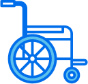 A blue wheelchair sits, appearing ready for use, against a black background.