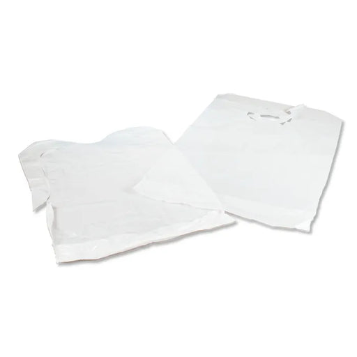 Two white plastic bags lie on a white surface; one is folded, the other is unfolded and slightly crumpled.