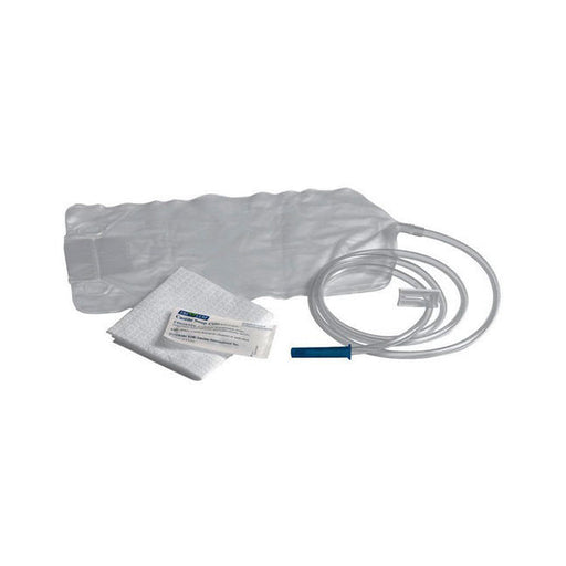A plastic bag for enema sits with tubing, a wipe, and a small packet; all are laid out on a surface.