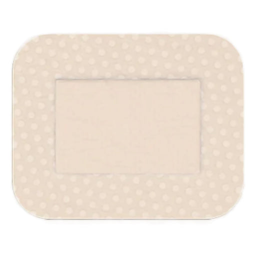 A beige adhesive bandage, featuring a lighter beige central area and a dotted border, sits on a white background.