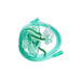 A light-green nebulizer mask and tubing lie coiled on a white surface.