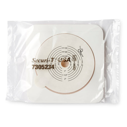 A SecuriT 7305234 medical adhesive disc with measurement markings is packaged in a clear plastic sleeve.