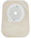 A beige, rectangular ostomy appliance features a central, circular template with millimeter markings for sizing, indicating its use for medical purposes.
