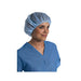 A light blue bouffant cap is worn by a person, who is facing the right, in a light blue medical scrub top.