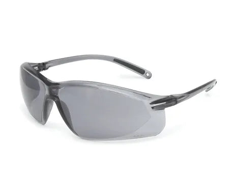 Gray safety glasses rest on a white background. They are positioned at a slight angle.