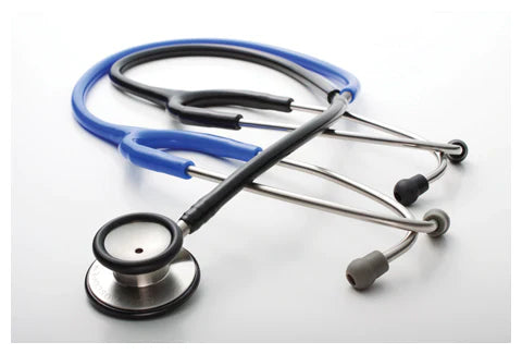 A stethoscope, with a black chest piece and blue tubing, lies on a plain white background.