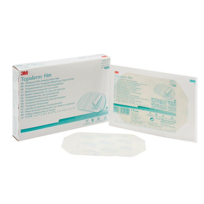 A box of Tegaderm Film transparent film dressings sits beside an individual dressing and its packaging. The dressings are rectangular with rounded corners, and feature a central adhesive area. The box displays multilingual text describing the product.