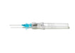 A clear intravenous cannula, lies horizontally on a white background. The cannula is ready for use.