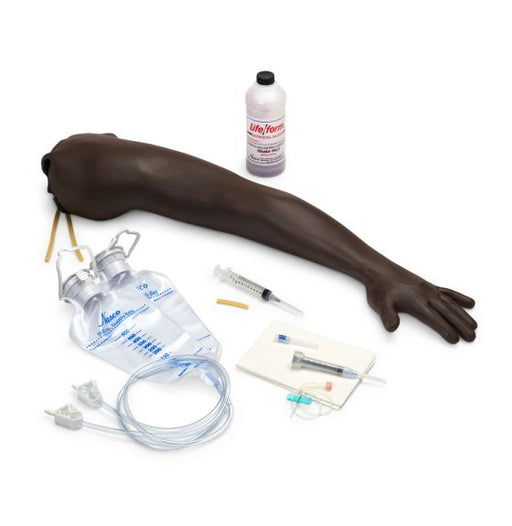 A realistic-looking arm model lies on a white background; it is accompanied by medical supplies including intravenous tubing, syringes, and a bottle of solution, suggesting it is used for medical training.