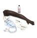 A realistic-looking arm model lies on a white background; it is accompanied by medical supplies including intravenous tubing, syringes, and a bottle of solution, suggesting it is used for medical training.