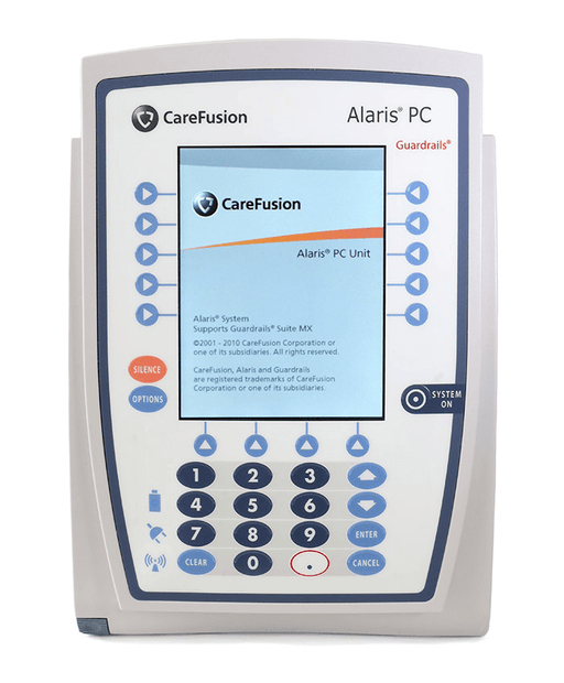 A medical device, displaying information and controls, sits on a plain background. The screen shows "CareFusion Alaris® PC Unit" and copyright information. A numerical keypad is prominent among other controls.