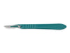 A teal scalpel rests on a white background.