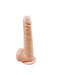 A flesh-toned, artificial penis stands upright on a small, circular base against a white background.