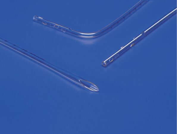 Three clear tubes, possibly catheters, lie on a blue surface. One is straight, one is curved, and one is shorter and slightly curved. They have small holes along their lengths.