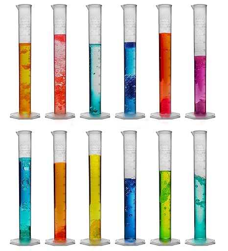 Twelve graduated cylinders contain various colored liquids. They stand upright on a white background.
