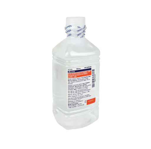 A translucent plastic bottle, filled with a clear liquid, sits against a plain white background. The bottle has a label with indiscernible text.