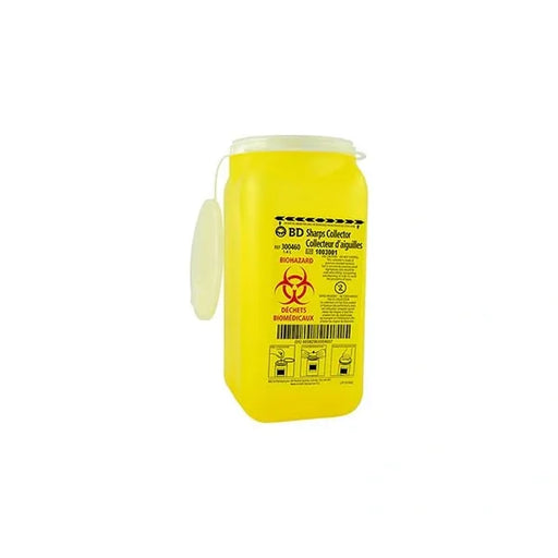  A yellow, rectangular sharps container sits upright. It has a hinged lid and is labeled "BD Sharps Collector" and "Collecteur d'aiguilles," with biohazard symbols and instructions. The container is likely for medical waste disposal.