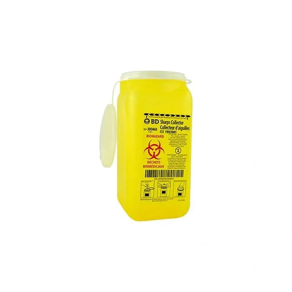  A yellow, rectangular sharps container sits upright. It has a hinged lid and is labeled "BD Sharps Collector" and "Collecteur d'aiguilles," with biohazard symbols and instructions. The container is likely for medical waste disposal.