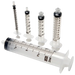 Several syringes of varying sizes are arranged on a dark background. They are made of clear plastic with black markings. The largest syringe is labeled "BD 2oz".