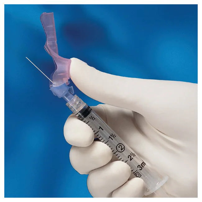 A 3ml syringe is held, with a safety cover partially removed, against a blue background.