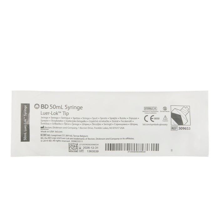A 50 mL BD Luer-Lok tip syringe, sterile, is packaged for sale; the label displays multilingual names, manufacturing information, and a lot number 1363539 expiring 2026-12-31.