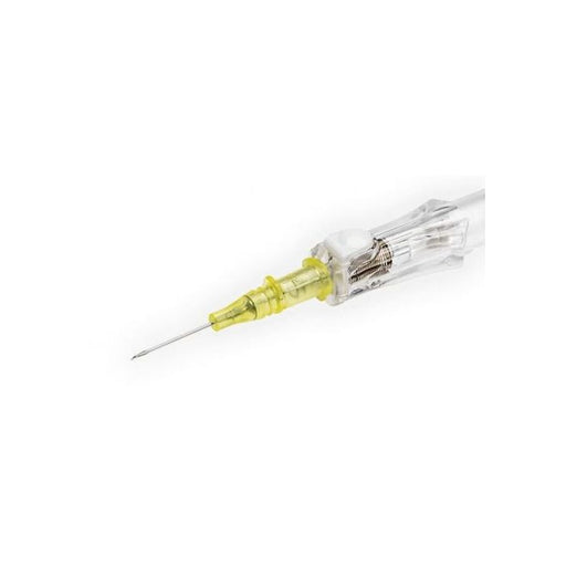 A clear intravenous cannula with a yellow catheter lies on a white background.