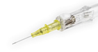 A yellow intravenous cannula rests on a gray surface; its needle is pointed towards the lower left.