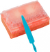 A rectangular, orange sponge brush with plastic bristles is shown with a teal spatula-like tool resting on it.