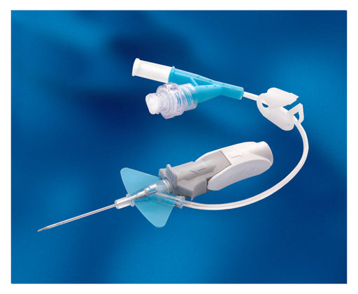 A medical intravenous catheter lies on a blue background. It is composed of a needle, tubing, and connectors.