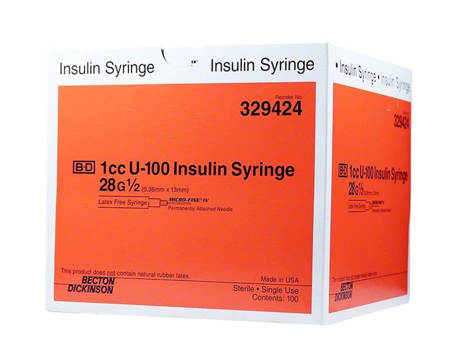 A box of 1cc U-100 insulin syringes (28G 1/2) sits on a white background. The box is orange and white, contains 100 syringes, and is labeled with the reorder number 329424.