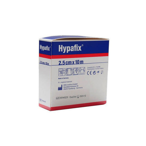 A roll of Leukoplast Hypafix adhesive non-woven fabric bandage sits beside its box; both display multilingual labeling.