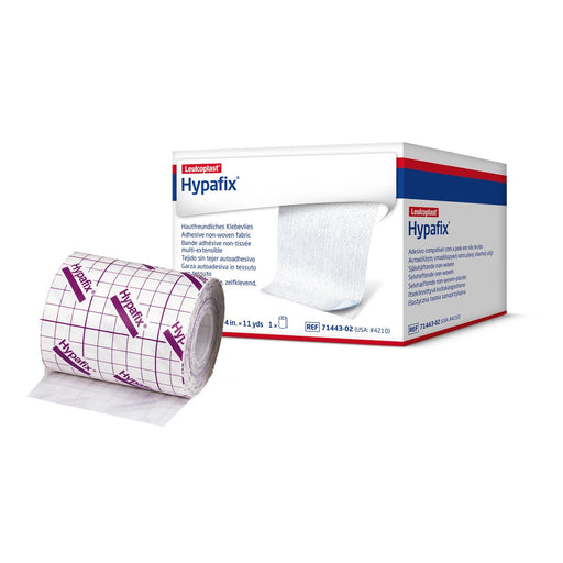 A roll of Leukoplast Hypafix adhesive non-woven fabric bandage sits beside its box; both display multilingual labeling.