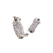 Two urine collection bags lie on a white background. They are both white plastic with blue markings and tubes.