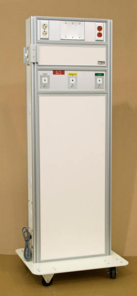 A tall, slender, off-white medical device stands on a small wheeled platform against a beige backdrop.