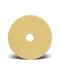 A pale-yellow, circular polishing pad rests on a white background.