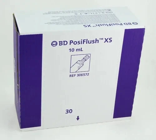 A cardboard box containing 30, 10 mL BD PosiFlush™ XS vials sits on a surface. BD PosiFlush™ XS, 10 mL, REF 306572 are printed on the box.