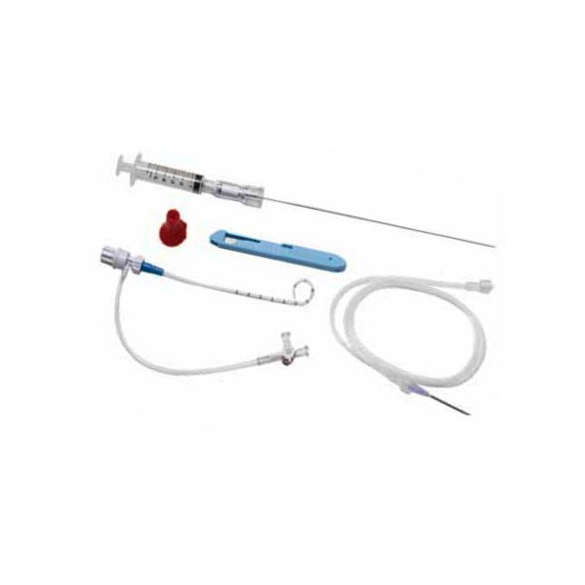 A medical intravenous (IV) catheter set, including tubing and needle, lies on a plain white background.