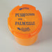 An orange plastic container with a screw-on lid is shown. The lid instructs: "PUSH DOWN WITH PALM WHILE TURNING," "OPEN," and "CLOSE TIGHTLY." The container sits on a plain, light surface.