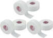 Four rolls of white 3M Medipore tape are displayed. The rolls are partially unrolled, showing the adhesive side. They are arranged on a plain white background.