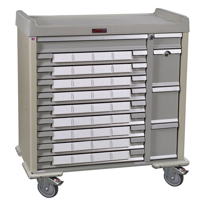 A tan medical cart with numerous small drawers sits on wheels. The cart is likely used for storage and transport within a medical facility.