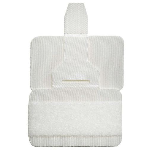 A white fabric fastener, folded, sits on a white background. The top section has a finger loop; the bottom section is hook-and-loop.