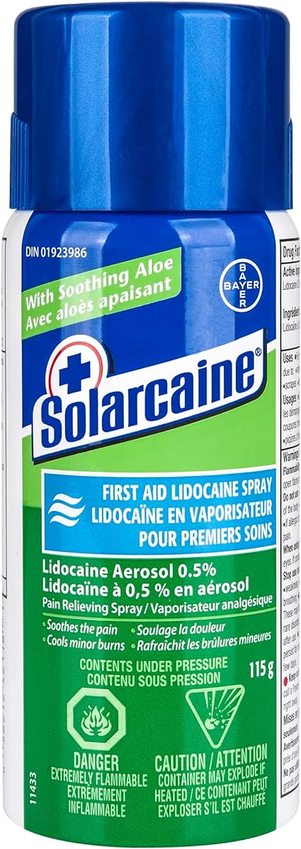 A Solaraine spray can sits upright. It contains lidocaine and aloe, providing pain relief and cooling minor burns. The container is labeled with safety warnings.