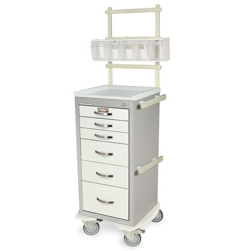 A five-drawer medical cart with a mounted shelf sits on wheels in a sterile environment. 